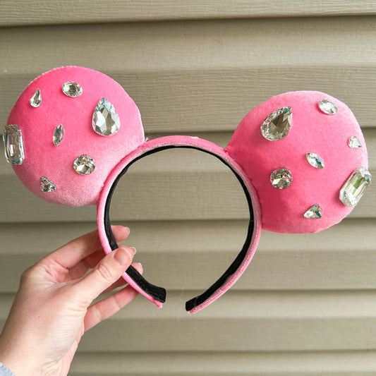 Pink velvet mouse ears with no bow. This pair includes clear gemstones of varying sizes ranging from small to large.